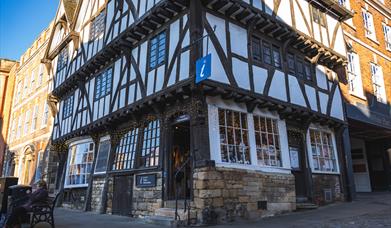 Image shows the Lincoln Visitor Information Centre, located in the tudor building Leigh Pemberton House